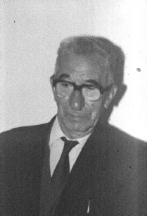 A black and white photograph of Bob Gumery
